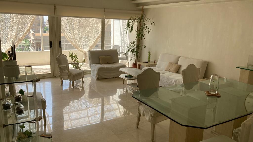 شقة ١٢٠متر في الدقي تشطيب كامل الدور السابع